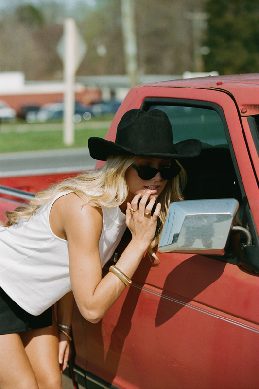 The Sleeveless Mock Neck Tee